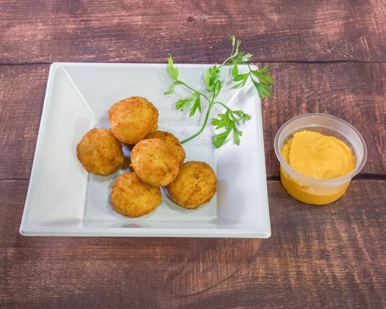 Cheddar Stuffed Jalapeños. 7 units.